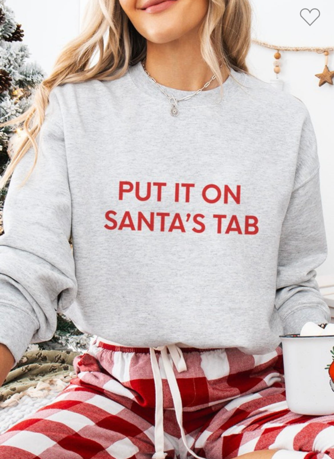 Put it on Santa’s Tab Sweater
